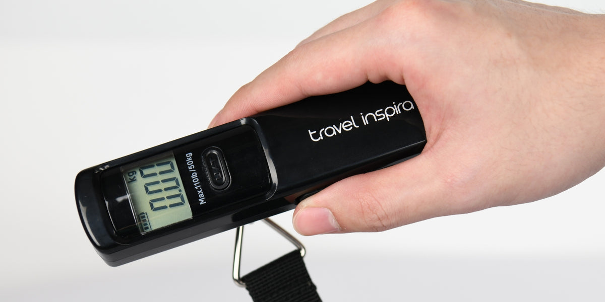 Travel Inspira black digital luggage scale for travel, displaying 00.00 kg